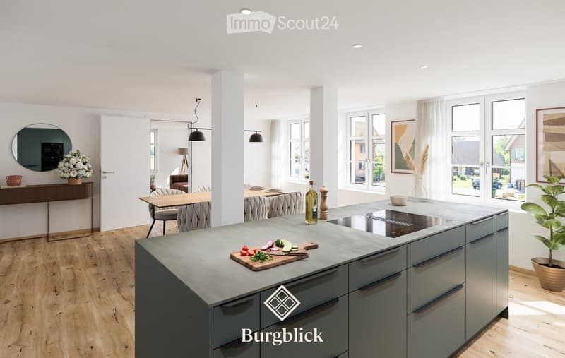 Modern kitchen with island, wooden floor, large windows, grey cabinets, and various kitchen items on the island.