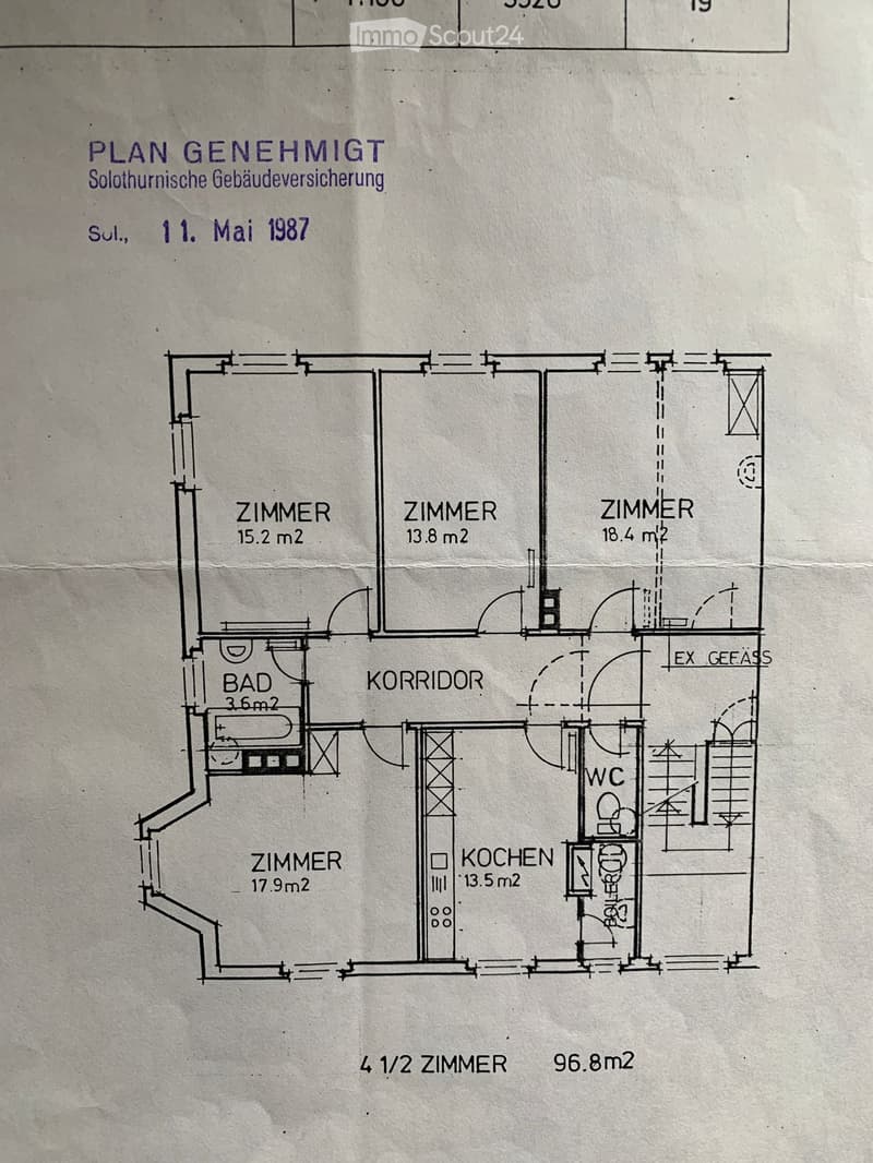 Floor plan of a 4.5-room apartment with labeled rooms including three bedrooms, a bathroom, a kitchen, a corridor, and a WC.