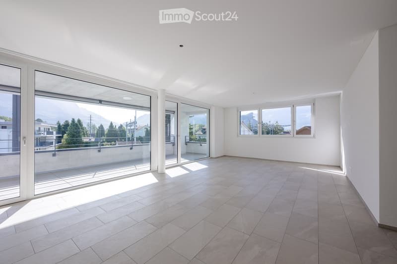 large windows, balcony, tiled floor, white walls
