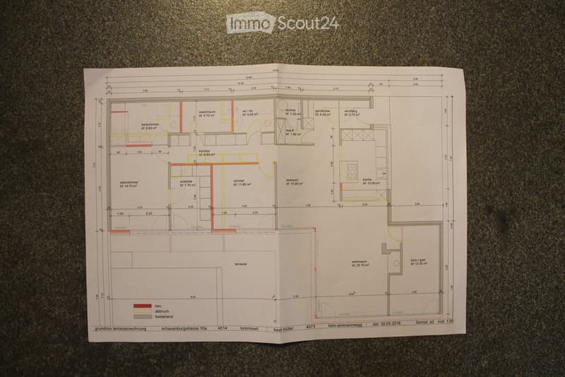 Floor plan of a terraced house showing multiple rooms including living room, kitchen, bedrooms, bathrooms, and terrace.