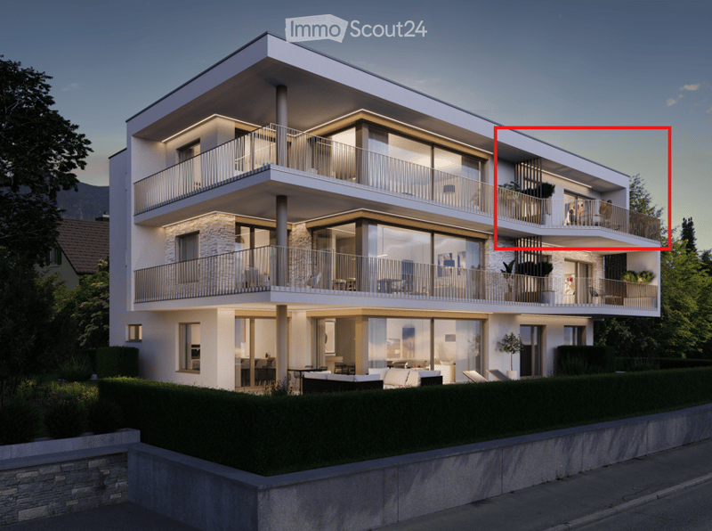 Modern three-story residential building with large glass windows, balconies, and contemporary design.