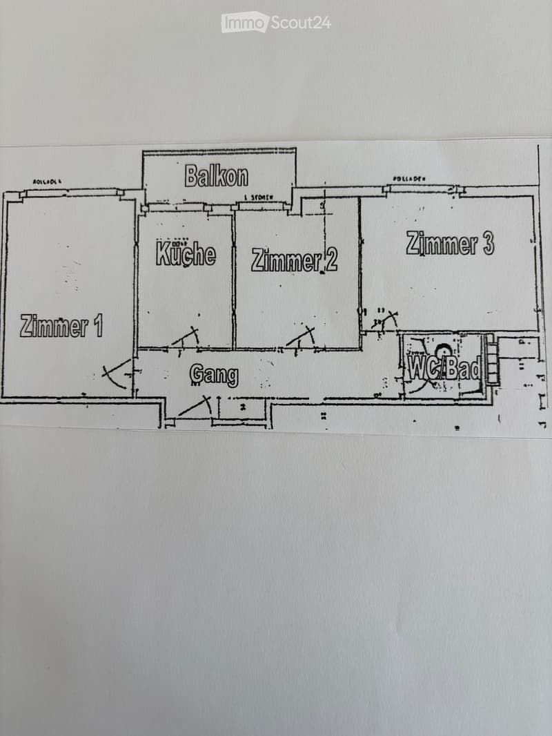 Floor plan showing a kitchen, three bedrooms, a bathroom, a hallway, and a balcony.