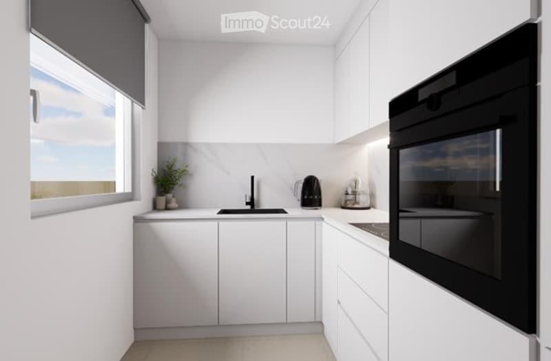 Modern, minimalist kitchen with white cabinets, a black oven, a sink with a faucet, and a small plant on the counter.