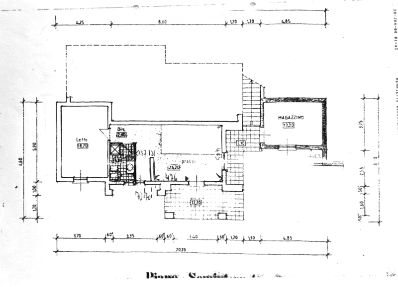 Floor plan showing a layout with labeled rooms including a living area, kitchen, and storage space.