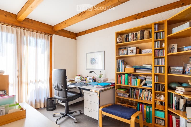 wooden ceiling, white wall, wooden desk, black chair, wooden shelf, white curtain