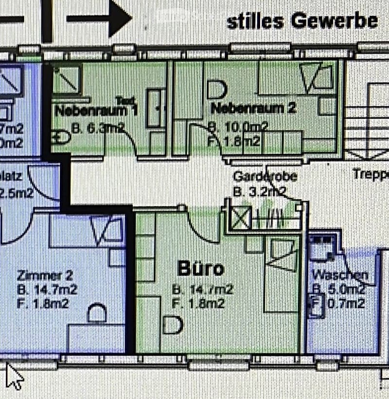 Floor plan of a commercial space with a main office area, two side rooms, a washroom, and a storage area.