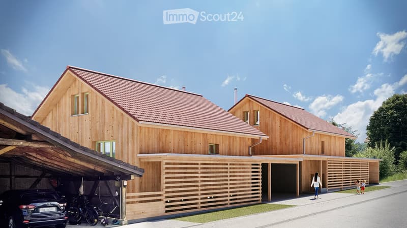 two story building, wooden facade, red roof, two garages