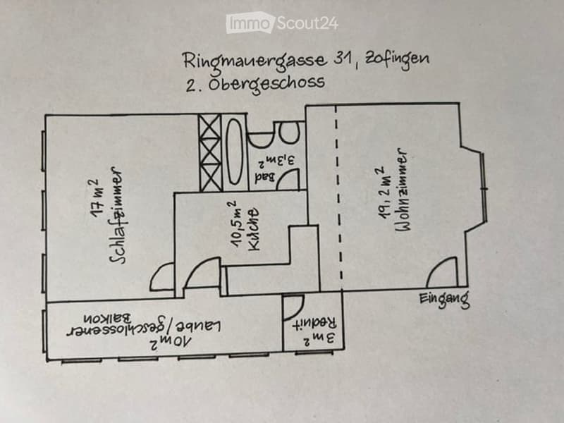 Floor plan of a 2nd floor apartment with a kitchen, living room, two bedrooms, and two bathrooms.