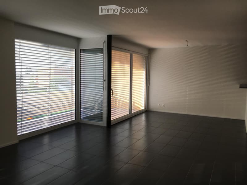empty room with two large glass doors and sliding windows