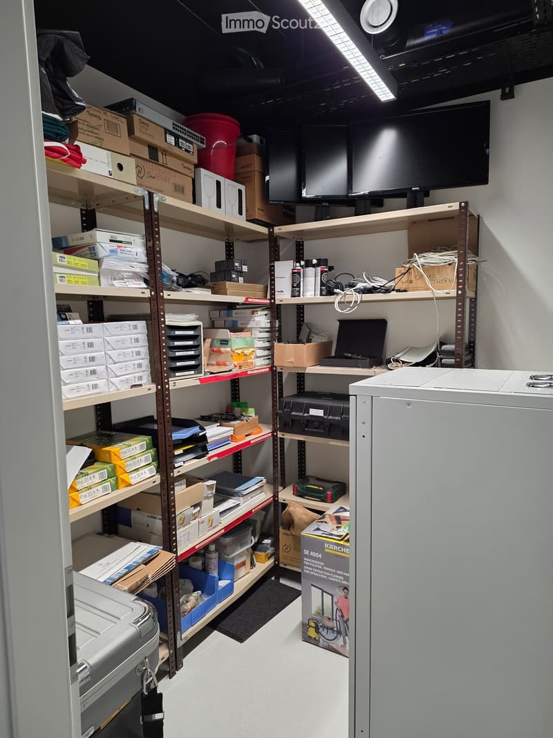 {"type": "Furnished Room", "objects": ["shelves", "boxes", "laptop", "printer", "screen", "cable", "laptop", "laptop", "laptop", "laptop", "laptop", "laptop", "laptop", "laptop", "laptop", "laptop", "laptop", "laptop", "laptop", "laptop", "laptop", "lapto