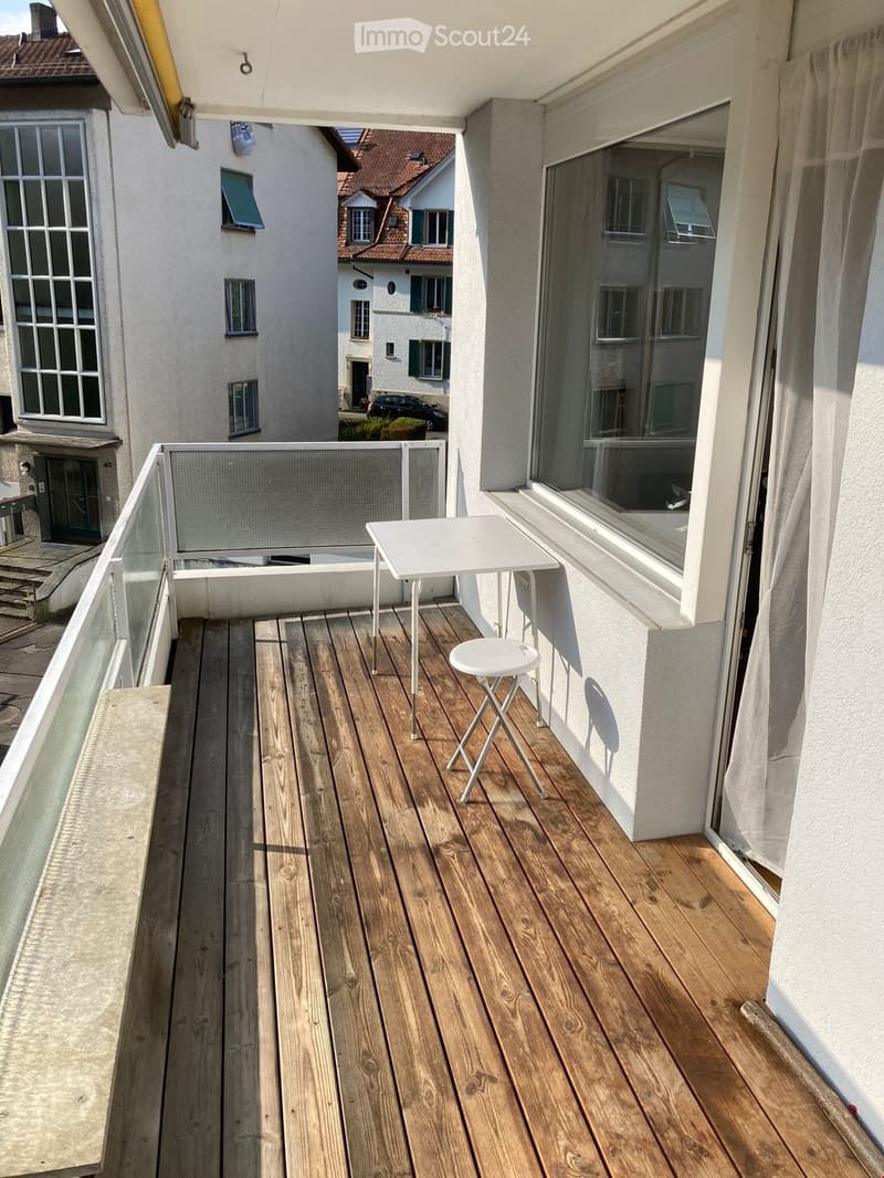 wooden deck, table, stool, white curtain