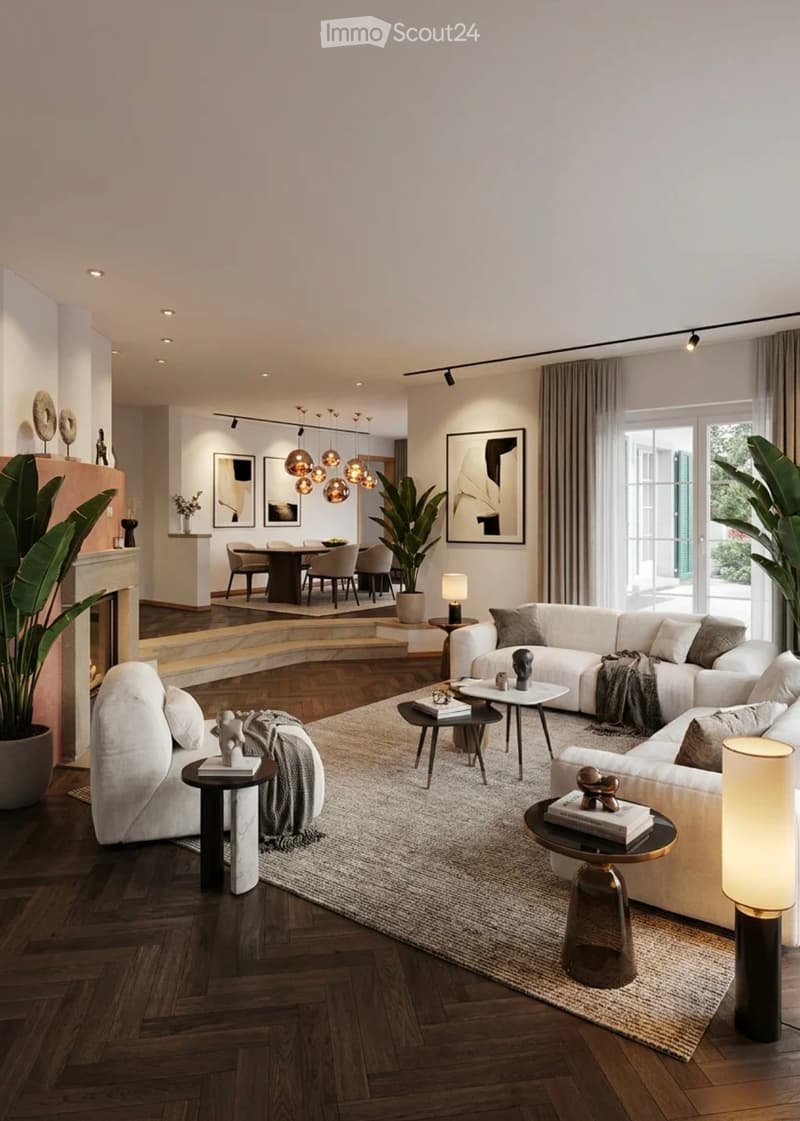 Modern living room with white sectional sofa, coffee tables, side tables, lamps, dining area with table and chairs, fireplace, artwork, and large windows with curtains.