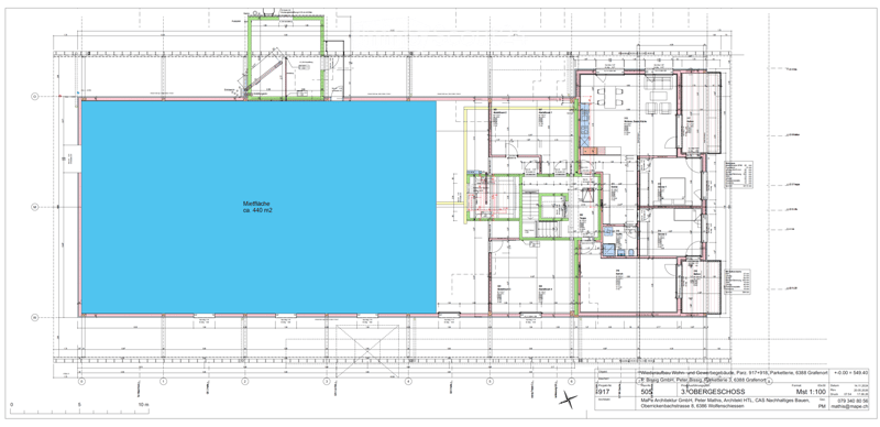 Floor plan of a residential and commercial building with a large parking area, multiple rooms including offices, storage, and service areas.