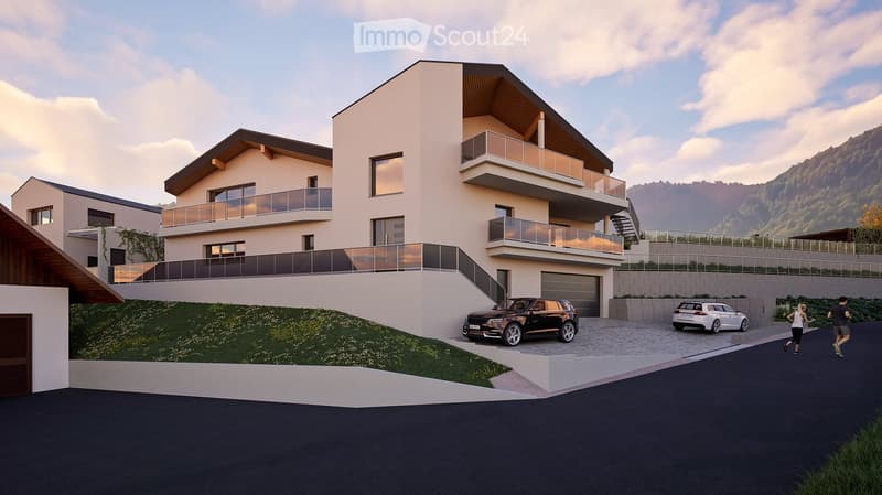 Modern two-story residential building with balconies, garage, and surrounding greenery.