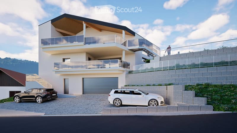 Modern two-story house with white exterior, black roof, large garage, and two balconies overlooking a scenic view.