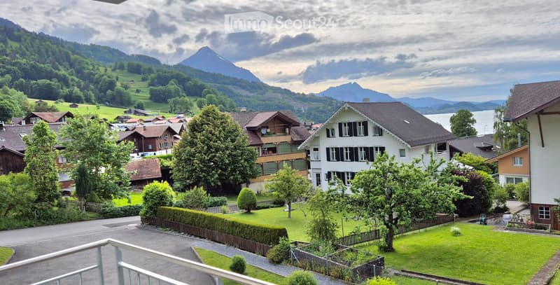 Houses with mountain and lake view, gardens, and trees