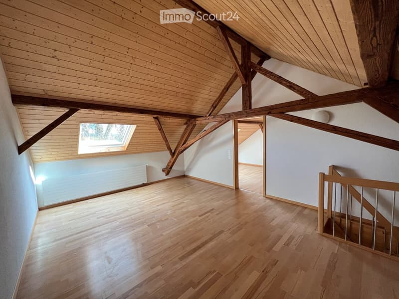wooden ceiling, wooden floor, white walls, wooden staircase, window, radiator