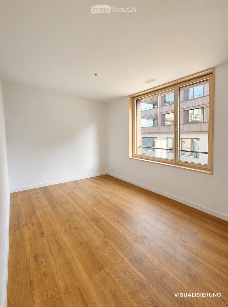 Empty room with light wooden flooring and white walls, featuring a large window with wooden frame and glass panels.
