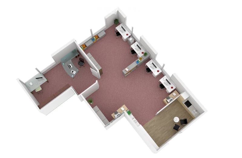 Top-down floor plan of a modern office space with workstations, desks, chairs, and a small kitchenette area. The layout includes multiple workstations arranged around a central open area, with a break room featuring a small table and chairs.