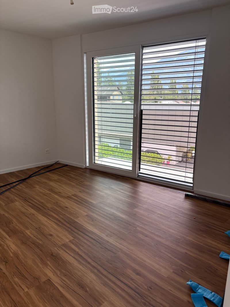 Chambre parentale avec parquet bois et SDB exclusive.