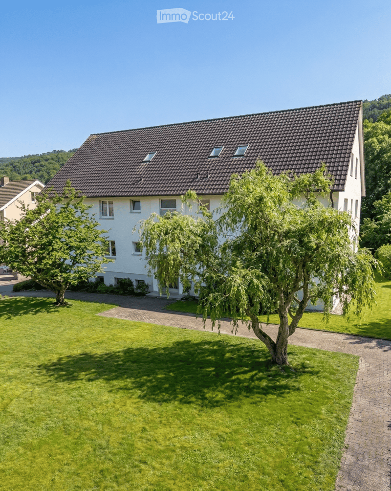 2 story house, white walls, brown roof, windows, driveway, trees, lawn