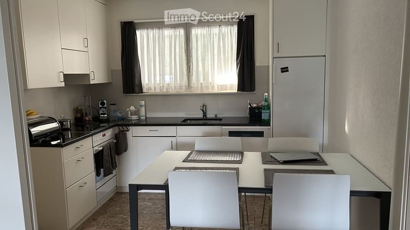 {"type": "Kitchen", "objects": ["refrigerator", "oven", "sink", "faucet", "table", "chair", "laptop", "oven mitt", "oven mitt", "oven mitt", "oven mitt", "oven mitt", "oven mitt", "oven mitt", "oven mitt", "oven mitt", "oven mitt", "oven mitt", "oven mitt