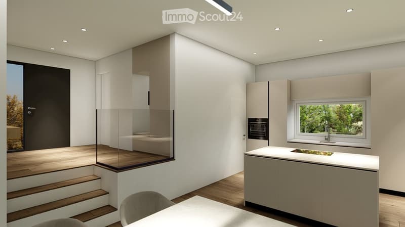 Modern kitchen with light-colored cabinets, a central island, and a large window overlooking greenery. Features include a built-in oven, sink, and a small seating area with a table and chairs.