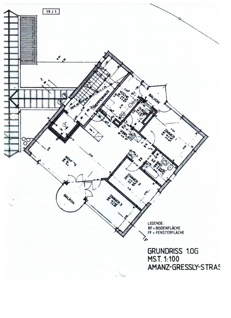 Floor plan of a residential unit showing a kitchen, living room, three bedrooms, two bathrooms, and two balconies.