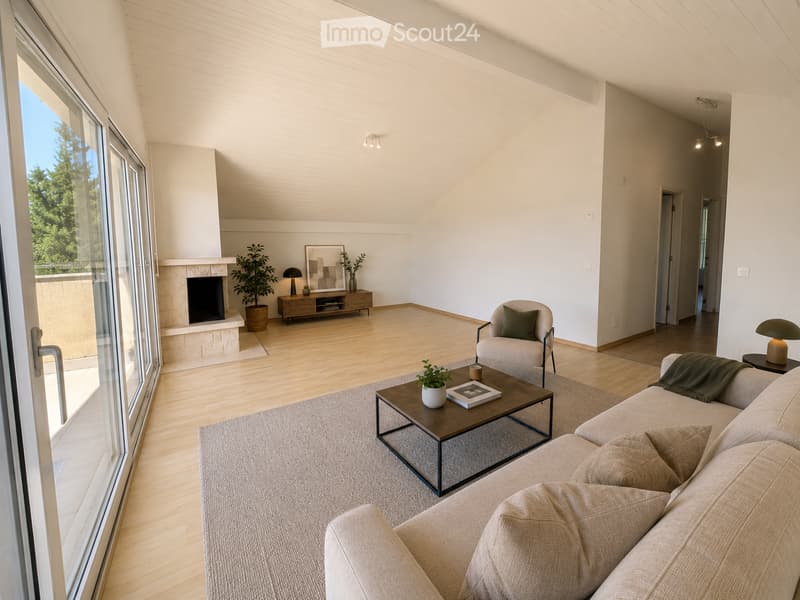 Modern living room with large windows offering a view, featuring a beige sofa, coffee table, armchair, fireplace, and decorative plants.