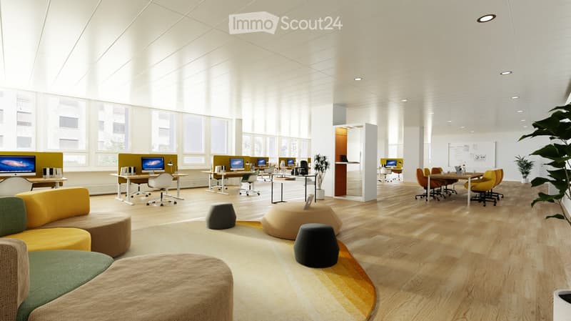 Modern office space with large windows, wooden flooring, and contemporary furniture including sofas, stools, chairs, tables, and laptops.