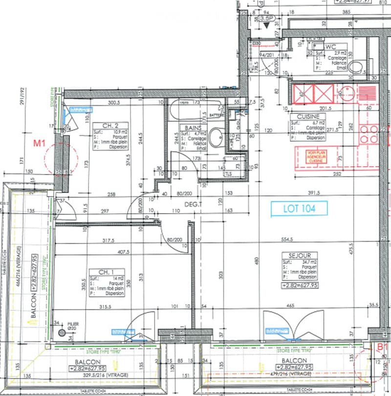Floor plan of a multi-unit building showing various rooms including a kitchen, bathrooms, living areas, and balconies.