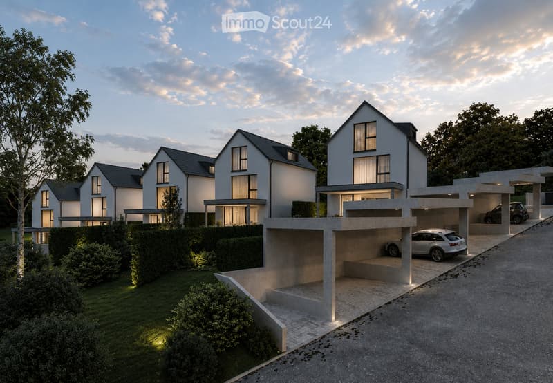 Modern two-story house with a contemporary design, featuring large windows, a raised ground floor, and a covered parking area with multiple cars.