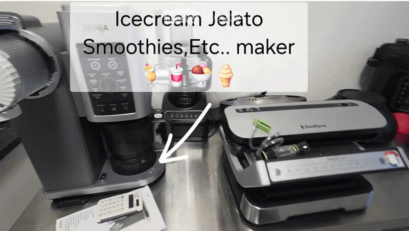A kitchen counter with a coffee maker, an ice cream maker, and a remote control. The ice cream maker is highlighted with a text overlay indicating it can make ice cream, gelato, smoothies, etc.
