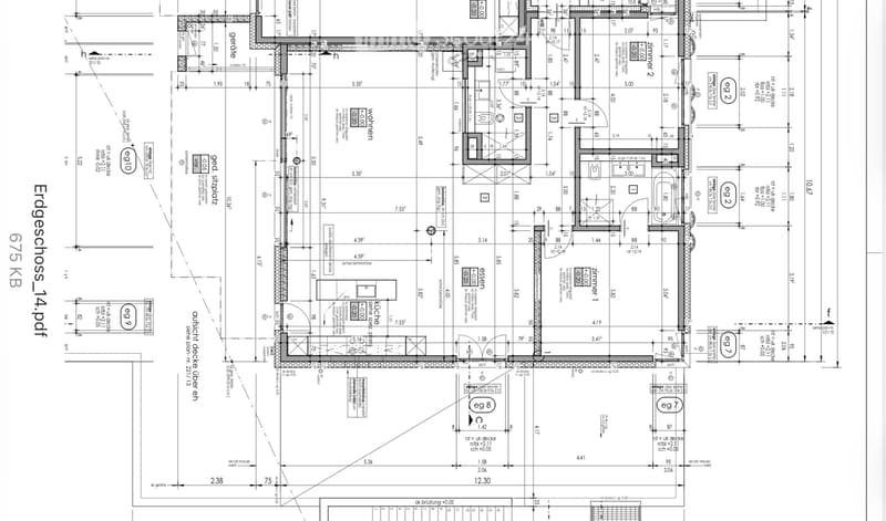Floor plan of a ground floor showing multiple rooms including living area, kitchen, bedrooms, and bathrooms with labeled dimensions and room numbers.