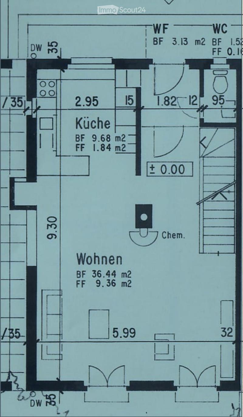 Floor plan showing a kitchen, living area, and bathroom with dimensions and room labels.