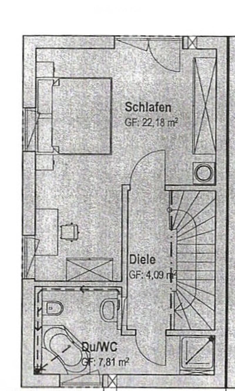 Floor plan of a small apartment with a bedroom, living area, and bathroom. The bedroom is labeled 'Schlafen' with an area of 22.18 m², the living area is labeled 'Diele' with an area of 4.09 m², and the bathroom is labeled 'Du/WC' with an area of 7.81 m².