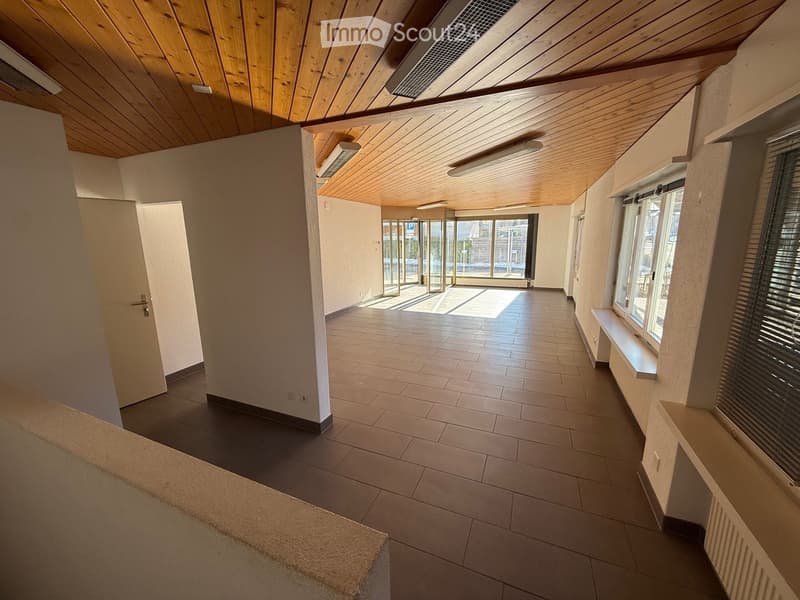 empty room, wooden ceiling, tiled floor, windows, sliding glass doors