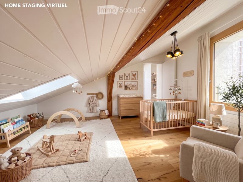 Bright, airy bedroom with wooden floors, large windows, and a cozy setup including a sofa, table, lamp, bookshelf, toys, a cradle, and decorative elements.
