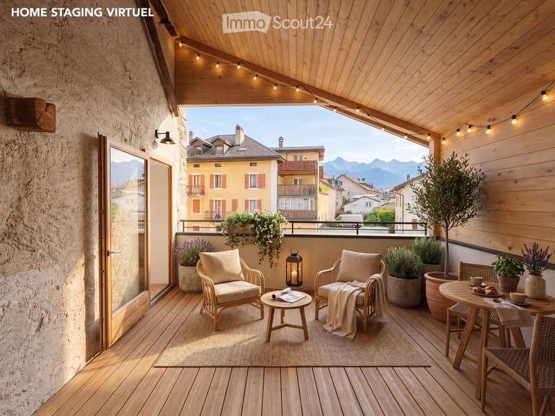Cozy wooden balcony with wicker chairs, small table, potted plants, and a scenic mountain view.