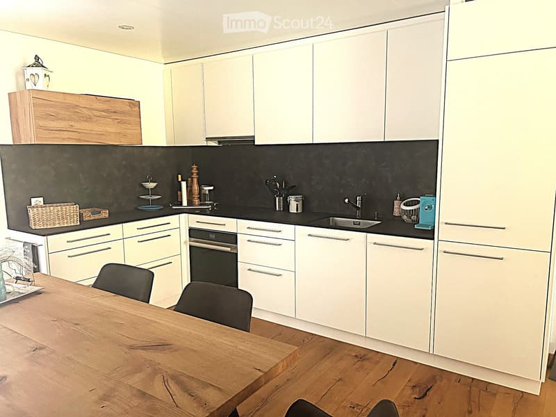 {"type": "Kitchen", "objects": ["table", "chair", "oven", "sink", "faucet", "cabinet", "wicker basket", "bottle", "cup", "bowl", "faucet", "bottle", "cup", "bottle", "cup", "bottle", "cup", "bottle", "cup", "bottle", "cup", "bottle", "cup", "bottle", "cup