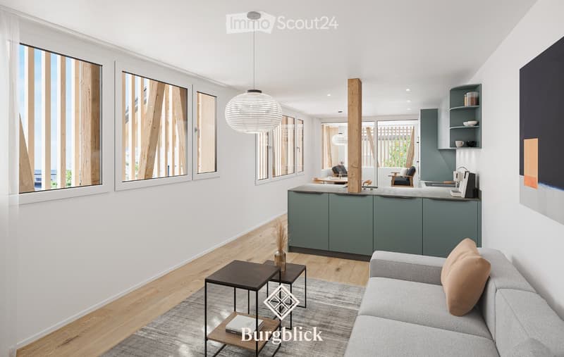 Modern open-plan living and dining area with grey sofa, coffee table, side tables, kitchen area with cabinets and counter, and large windows with wooden blinds.