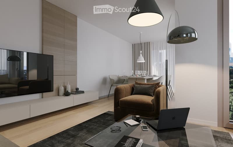 Modern living room with a brown sofa, glass coffee table, laptop, and decorative items. Features a sleek white entertainment unit, pendant lamps, and a dining area with chairs and a table.
