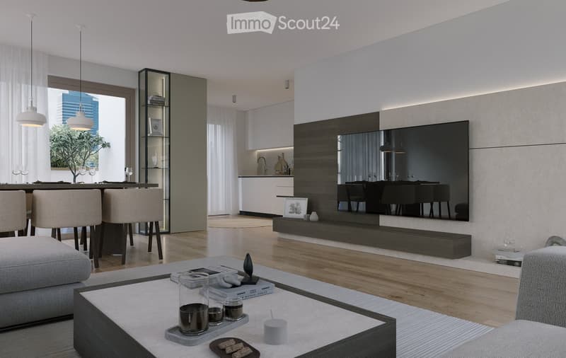 Modern living room with a grey sofa, coffee table, bar area, and kitchen in the background. Large windows offer a city view. The space includes a TV screen, decorative items, and stylish lighting.