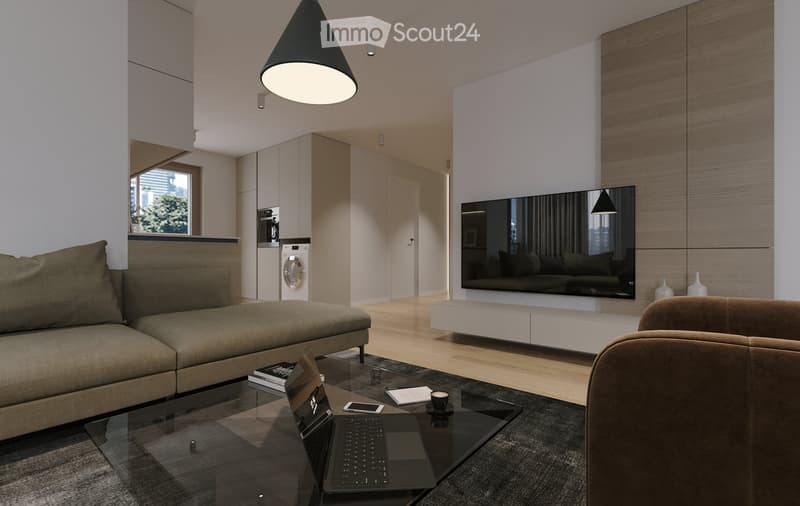 Modern living room with a sectional sofa, glass coffee table, laptop, TV, and pendant light. The space features a sleek design with a neutral color palette and contemporary furniture.