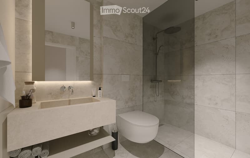 Modern bathroom with a large sink, toilet, shower, and mirror. Features marble tiles and a sleek design.