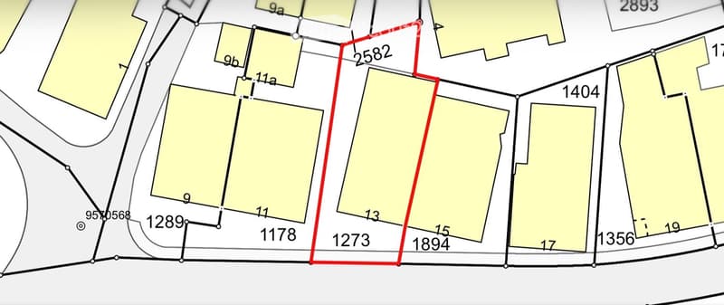 Floor plan showing multiple lots with labeled dimensions and boundaries. The highlighted lot is marked with red lines and labeled '2582'.