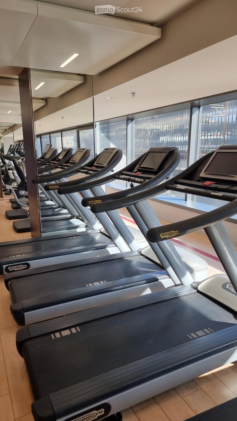 Row of treadmills in a gym