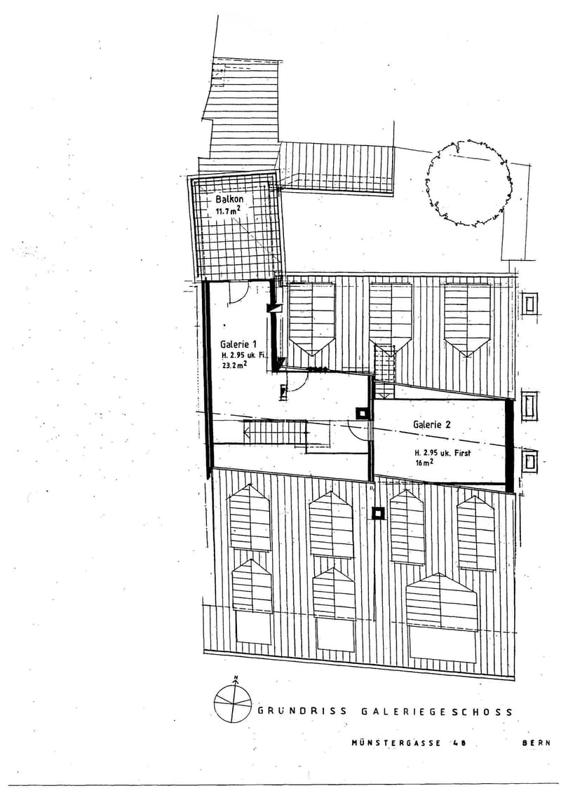 Floor plan of a gallery space showing a balcony, two galleries, and multiple rooms with dimensions labeled.