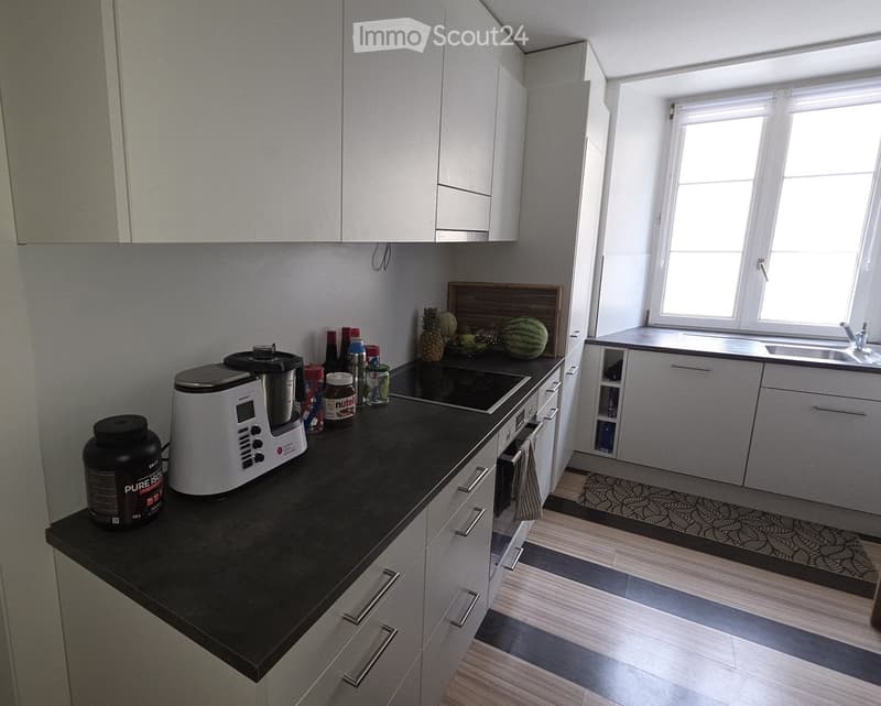 {"type": "Kitchen", "objects": ["oven", "fridge", "sink", "faucet", "cupboard", "bottle", "cup", "fridge", "oven", "bottle", "cupboard", "cupboard", "cupboard", "cupboard", "cupboard", "cupboard", "cupboard", "cupboard", "cupboard", "cupboard", "cupboard"
