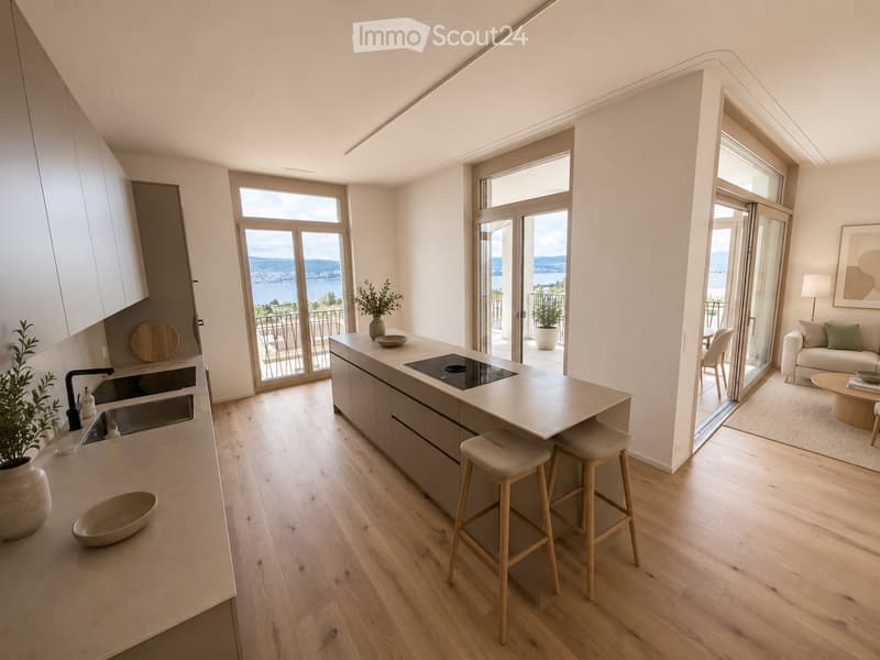 Open-plan kitchen and living area with light wood flooring, modern kitchen island, built-in stove, sink, and seating. Large windows and sliding doors open to a balcony with a scenic view.
